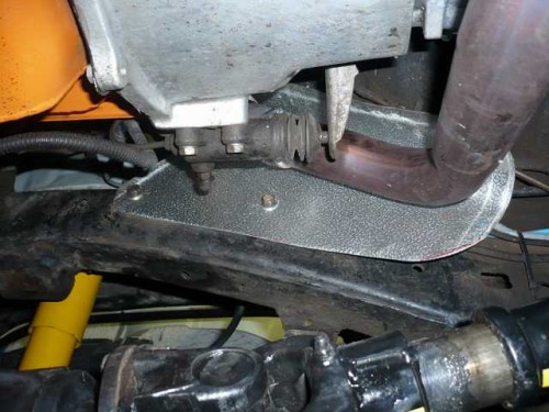 Manifold downpipe heatshield driver side 2.JPG