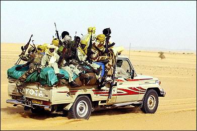 Chadian_soldiers_in_Toyota_pickup_truck_off_to_fight_the_Libyans.jpg